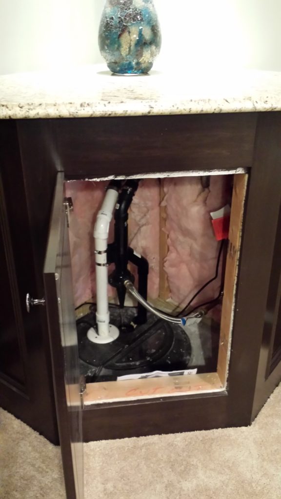 Hidden sump pump in basement | Basements Unlimited | Basement ...