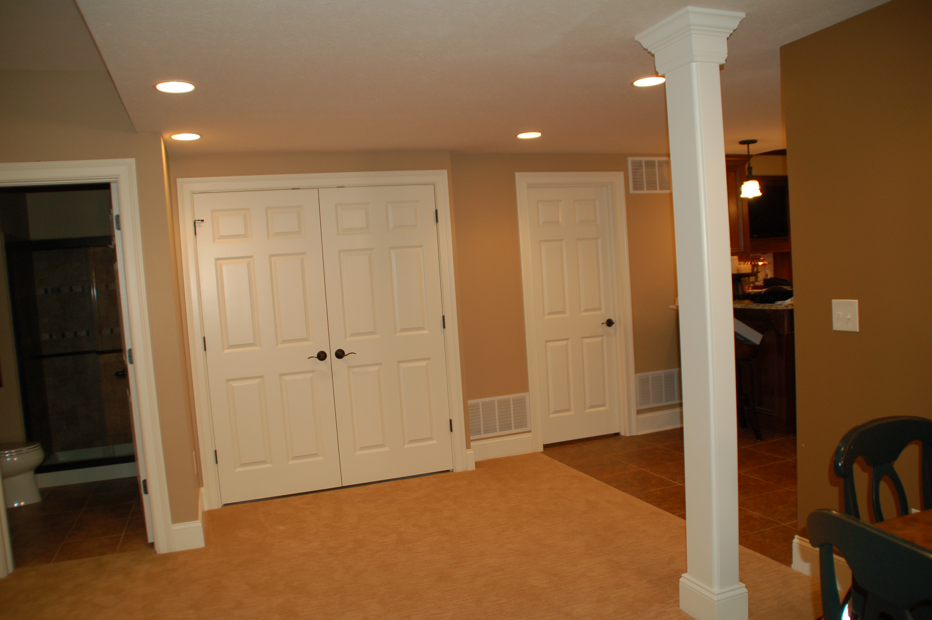 Hidden water heater and storage in basement