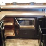 Basement finishing bar features lazy suzan, built in microwave and trash pull out Basement finishing bar features lazy suzan, built in microwave and trash pull out