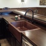Custom Basement Renovation Copper farm sink with drink ledge and custom wood bar top in Dublin basement Custom Basement Renovation Copper farm sink with drink ledge and custom wood bar top in Dublin basement