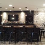 Custom Bar for basement renovation in Plain City Oh wood top with drink ledge and wine cabinets Custom Bar for basement renovation in Plain City Oh wood top with drink ledge and wine cabinets