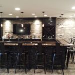 Custom Bar for basement renovation in Plain City Oh wood top with drink ledge and wine cabinets Custom Bar for basement renovation in Plain City Oh wood top with drink ledge and wine cabinets