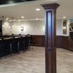 Basement Remodel with custom pole and plastic laminate floor Basement Remodel with custom pole and plastic laminate floor