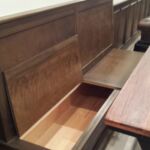 Basement remodeling finishes: Extra storage inside of bench Basement remodeling finishes: Extra storage inside of bench