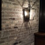 Basement Finishing Details: Sconce lighting with custom brick Basement Finishing Details: Sconce lighting with custom brick